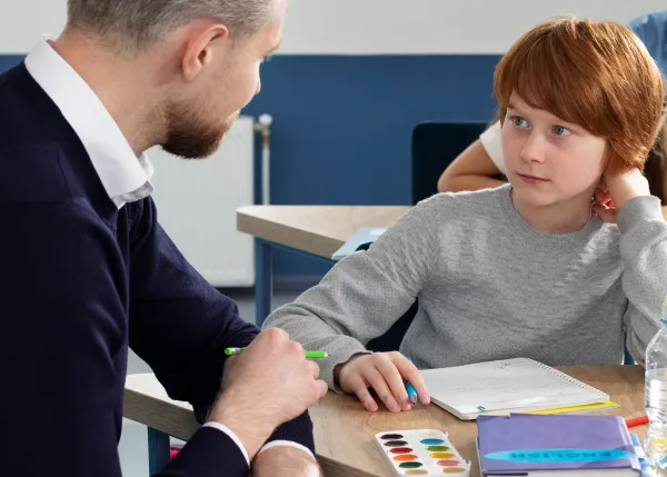 teacher-holding-english-class 1